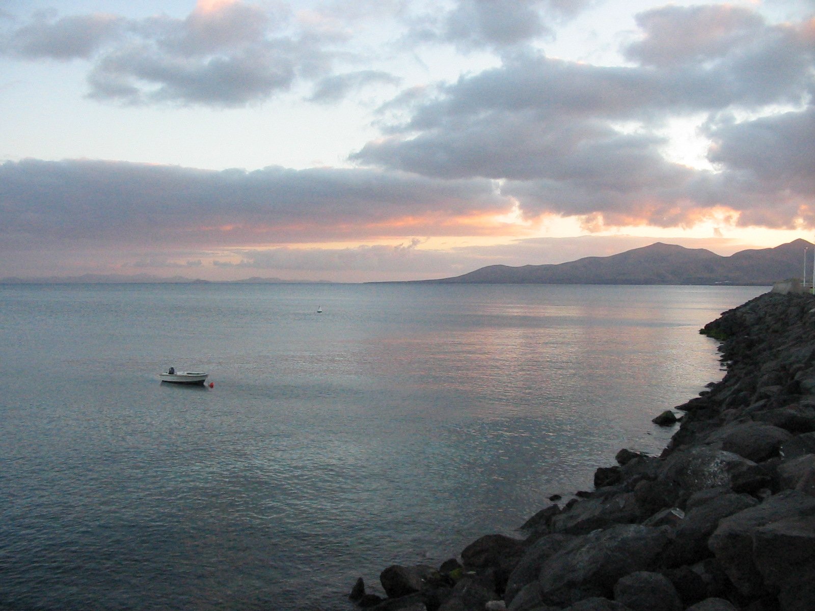 Zachód słońca nad zatoką Puerto del Carmen