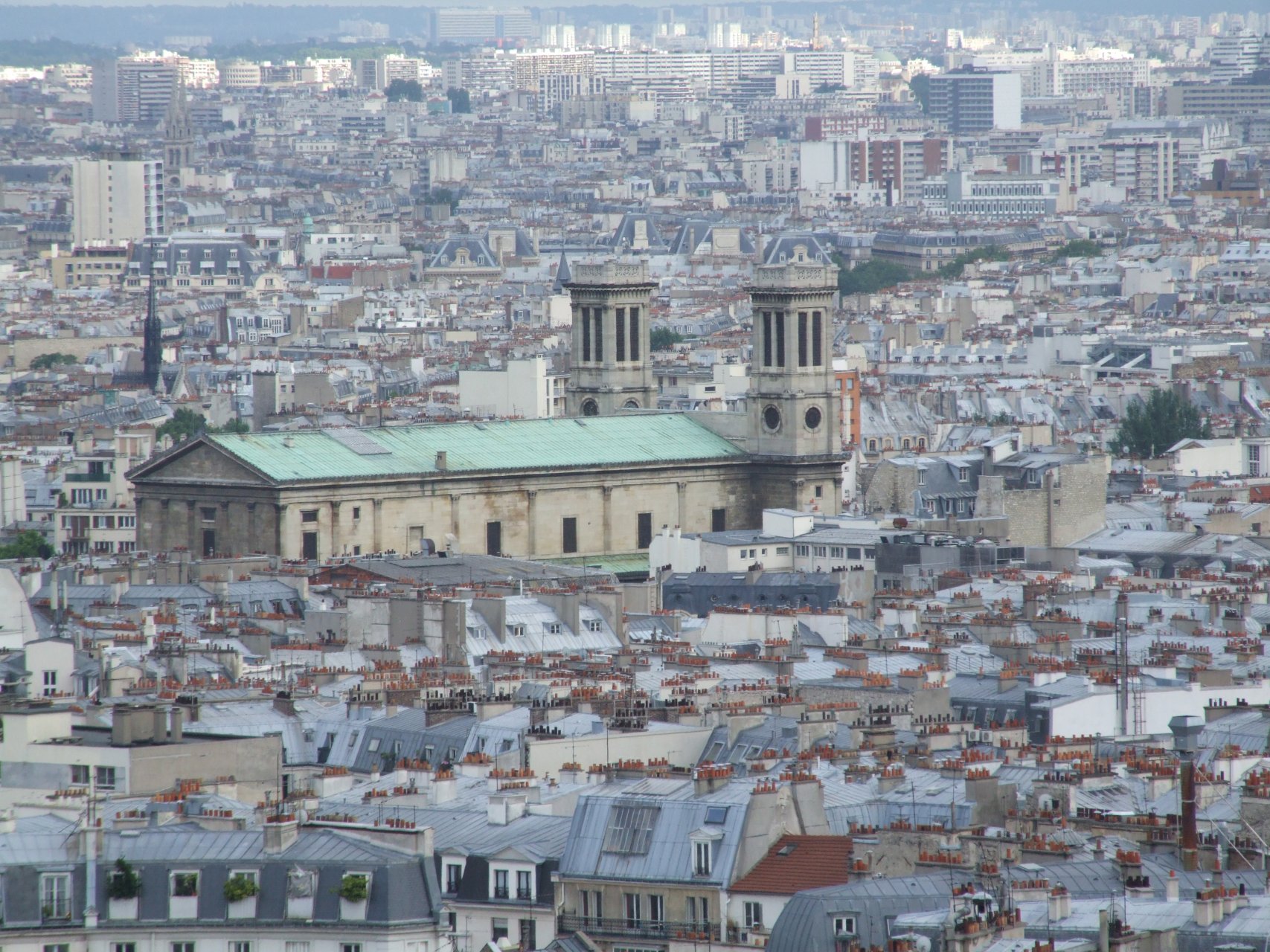 Widok z bazyliki Sacré-Cœur na Paryż (w tle Luwr)